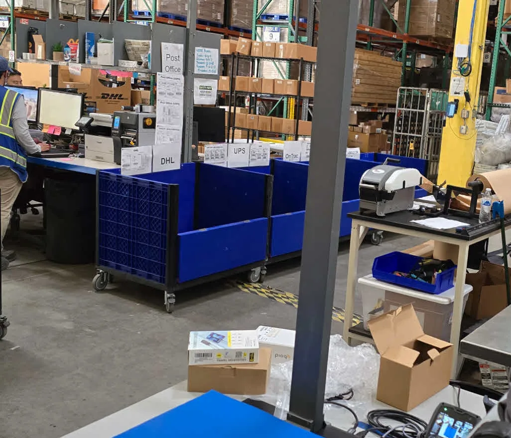 Ideal Fulfillment's shipping area, with the S1 in the foreground and carrier bins behind